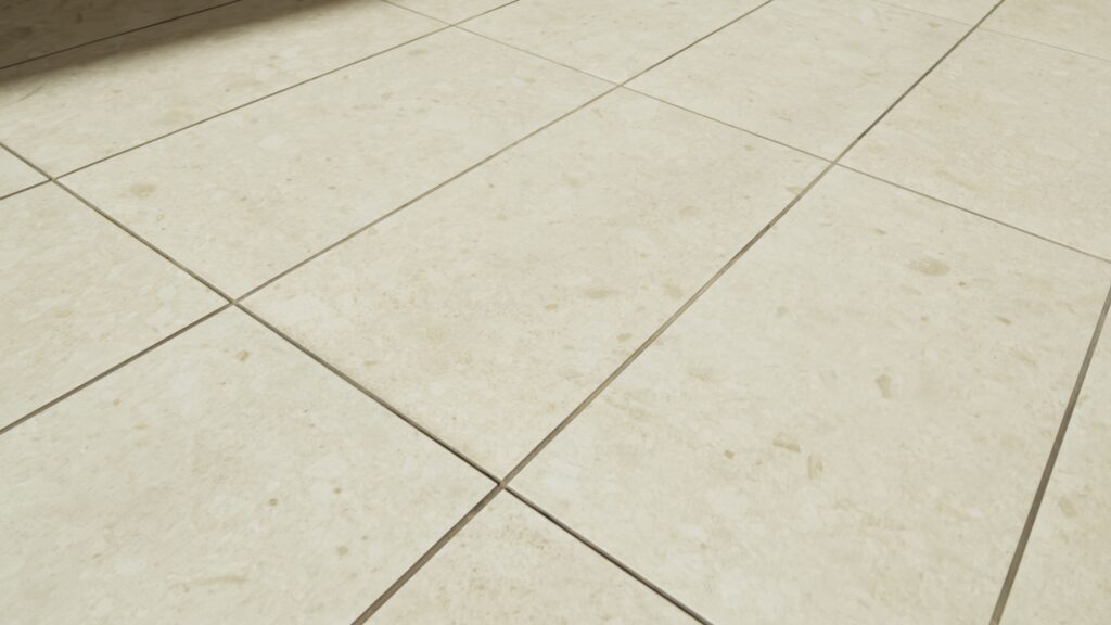 Close-up of large, beige natural stone flooring tiles with a subtle textured finish.